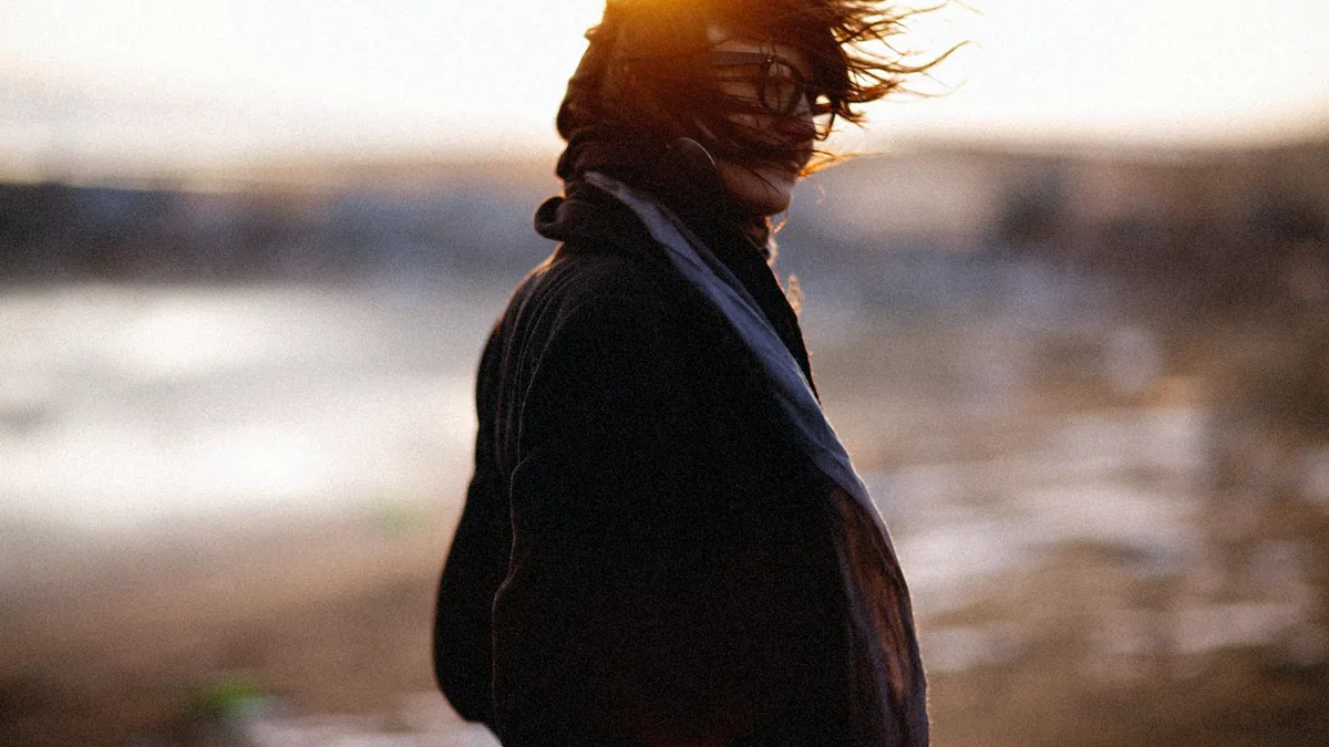 Backlit hair against a bright background, the case an automatic selection loses.