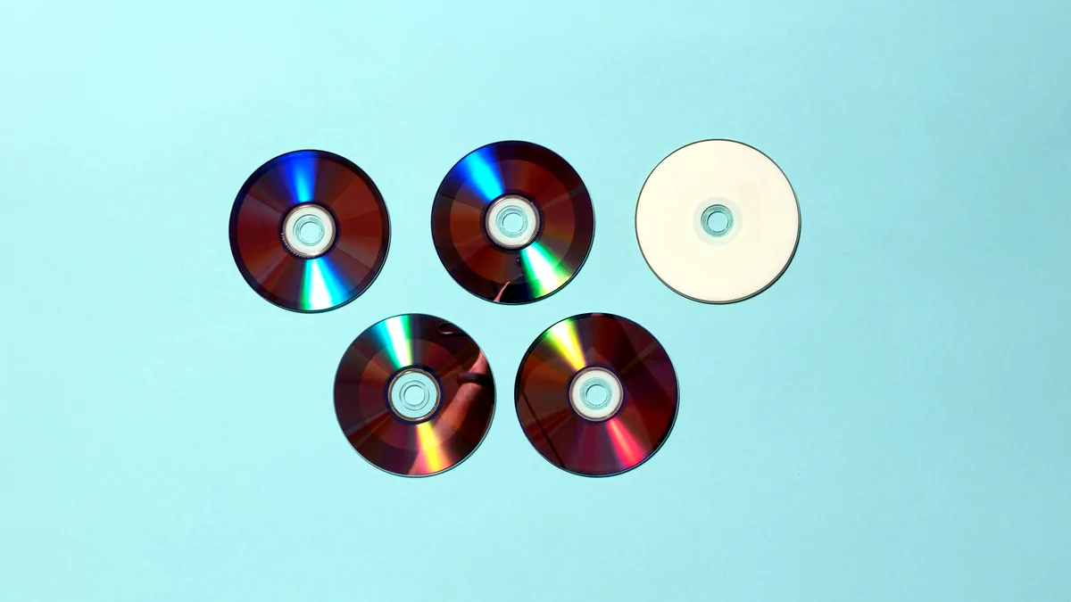 Boxed software on disc, how a version used to arrive.