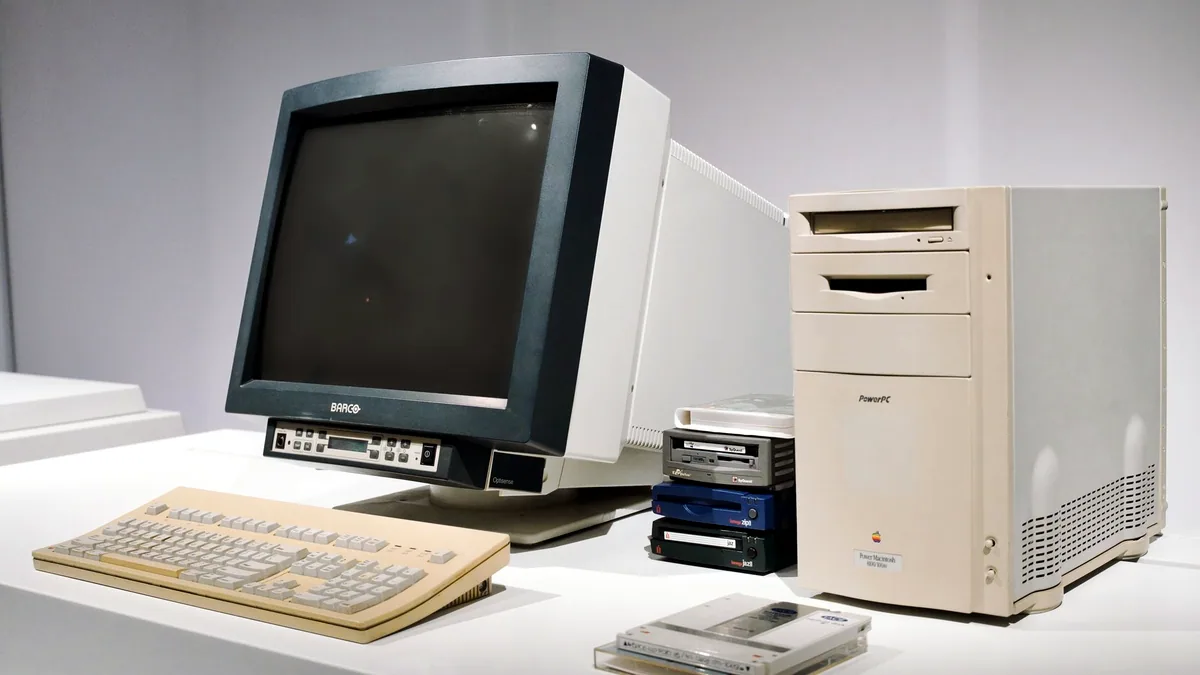 A CRT and a keyboard from the decade this site was written in.