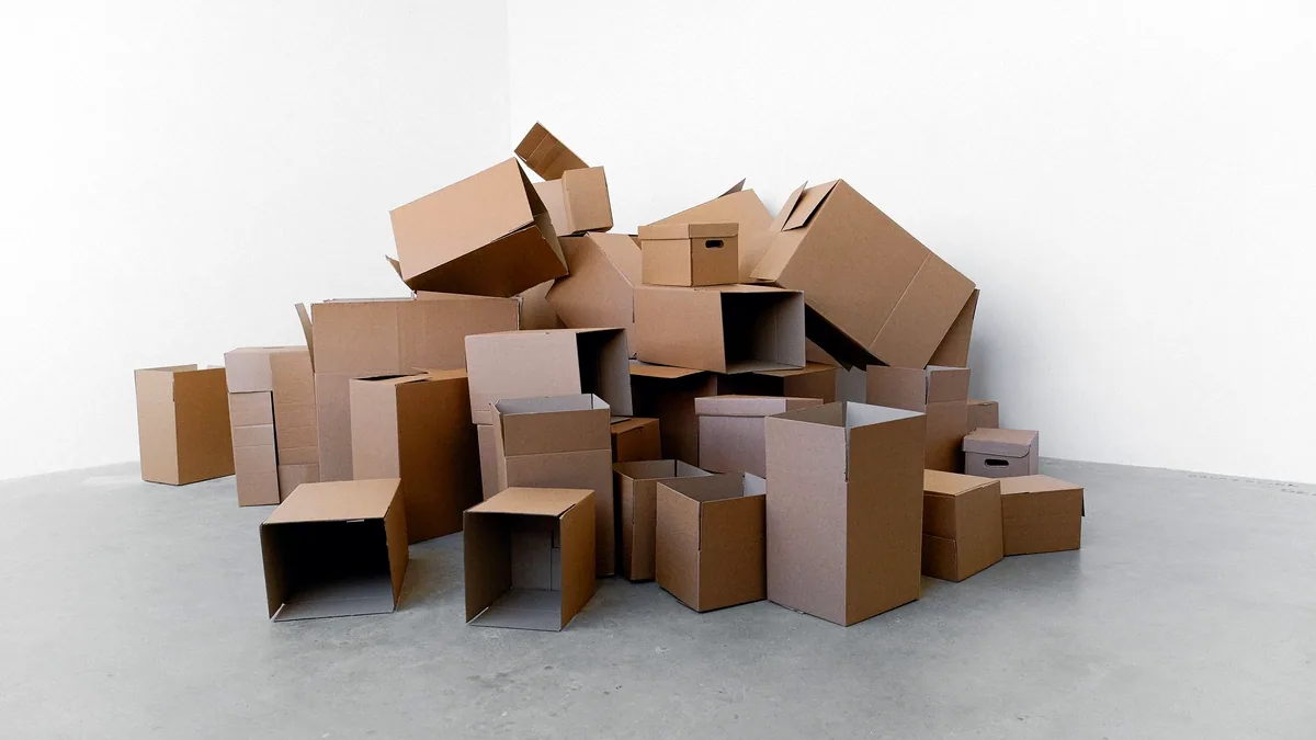 An office mid-move. The program went; the work it did had to go somewhere.